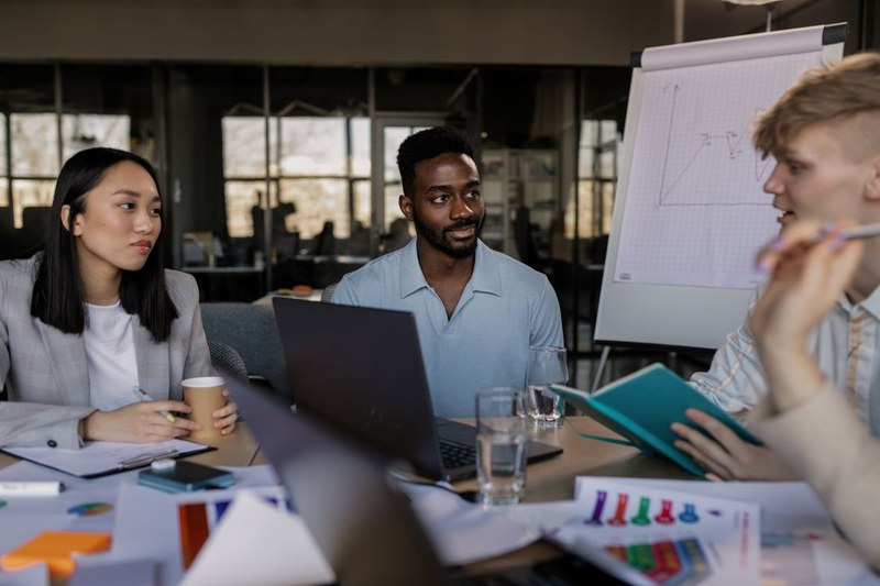 Professionals discussing in an office meeting